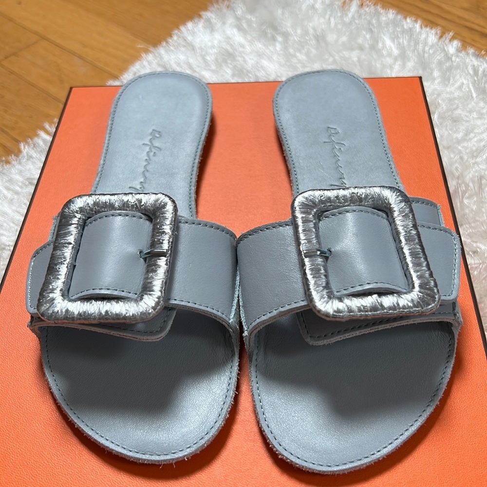 Definery light blue size 7 . Brand new no box. With dust bag.